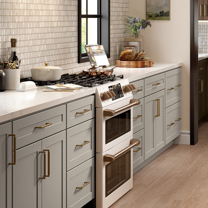 Gray Shaker Kitchen Cabinets with White Shaker Island and Deep Brown Butler Pantry - Omni Cabinet Door Style in Mineral with Island in Snow Finish and Butler Pantry in Bark Finish