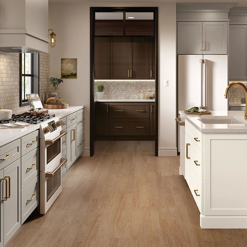 Gray Shaker Kitchen Cabinets with White Shaker Island and Deep Brown Butler Pantry - Omni Cabinet Door Style in Mineral with Island in Snow Finish and Butler Pantry in Bark Finish