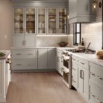 Gray Shaker Kitchen Cabinets with White Shaker Island and Deep Brown Butler Pantry - Omni Cabinet Door Style in Mineral with Island in Snow Finish and Butler Pantry in Bark Finish