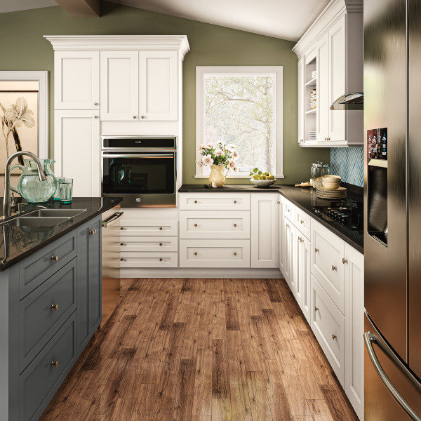 White Shaker Kitchen Cabinets and Deep Gray Island - Spectra Cabinet Door Style in Snow Finish and Omni Cabinet Door Style in Graphite Finish from Mantra Cabinets